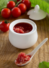 Horseradish sauce with tomatoes.