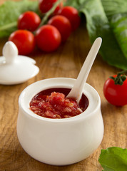 Horseradish sauce with tomatoes.