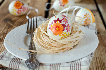 Painted easter egg on a plate