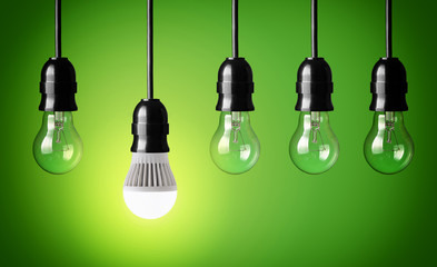 Glowing LED bulb and simple light bulbs