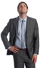 Smiling businessman with hand on hip