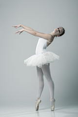 Portrait of the ballerina in ballet pose