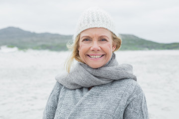 Portrait of a smiling senior woman at beach