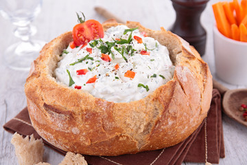 bread bowl with cheese spread