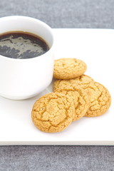 tasty cookies and black coffee