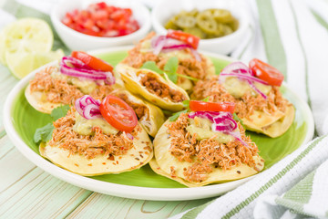 Panuchos - Mexican corn tortillas filled with refried beans
