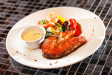 salmon steak with vegetables