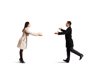 happy young couple going to each other