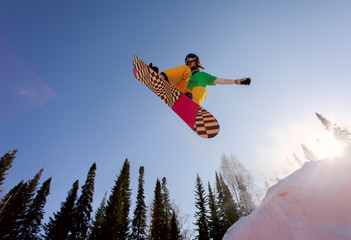 Snowboarder jumping