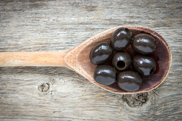 Spoon with olives