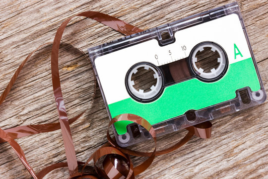 Retro audio cassette  on the wood background