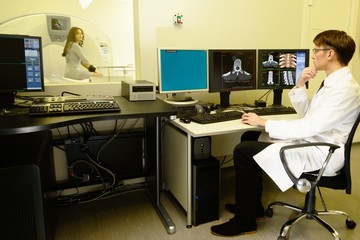 Doctor with woman patient  at the computed tomography
