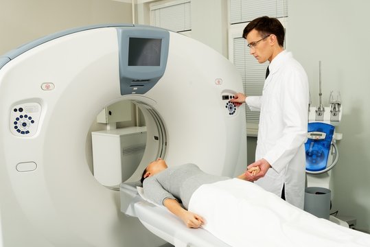 Young woman visiting computed tomography lab