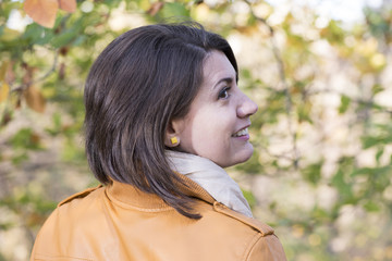 Fototapeta premium Portrait of a young woman with short brunette hair