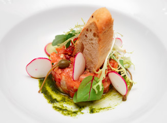Salmon carpaccio in plate close-up
