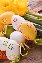 easter eggs with dots and yellow spring flower decoration