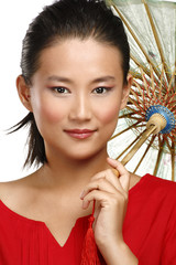Beautiful chinese girl with traditional homemade umbrella