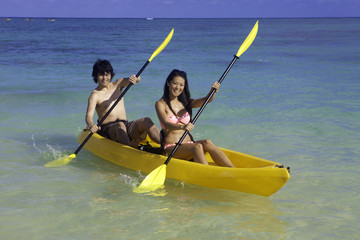 japanese couple in kayak