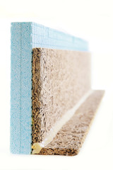 Polystyrene and wooden insulation object isolated on white