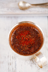 spiced red chillies hot chocolate on white table