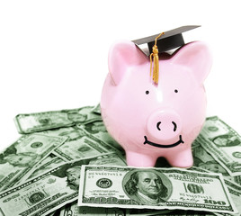 smiling piggy bank with graduation cap