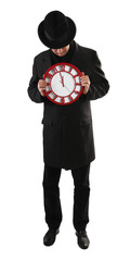 Man is holding clock and showing time