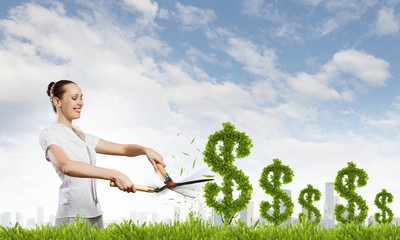 Woman cutting bush