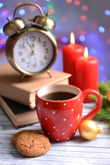 Composition of book with cup of coffee and Christmas