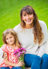 Portrait of happy mother and daughter