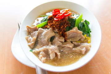 Fried noodle with pork, squid and shrimp soaked in gravy, Chines