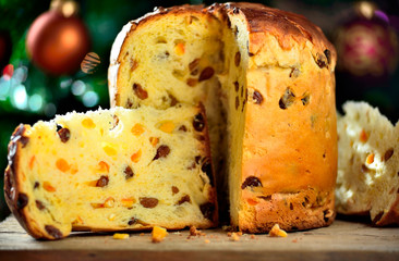 Panettone traditional italian Christmas cake. Typical Italian Christmas food - obrazy, fototapety, plakaty