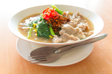 Fried noodle with pork, squid and shrimp soaked in gravy, Chines