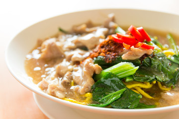 Fried noodle with pork, squid and shrimp soaked in gravy, Chines
