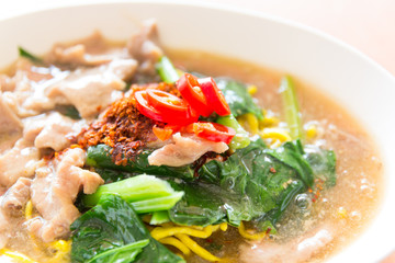 Fried noodle with pork, squid and shrimp soaked in gravy, Chines