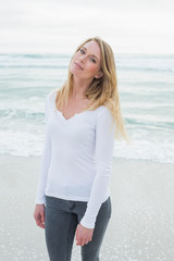 Portrait of a smiling casual woman at beach