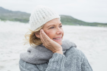 Senior woman looking away at beach