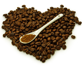heart made of coffee beans and instant coffee in spoon