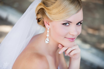 Beautiful bride outdoors - soft focus