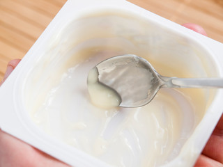 Scrape remnants of custard