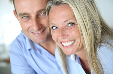 Portrait of cheerful blond couple