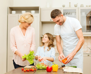 happy family making dinner in kitchen