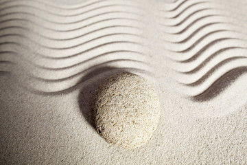 Fototapeta na wymiar pebble and sand for zen reflection
