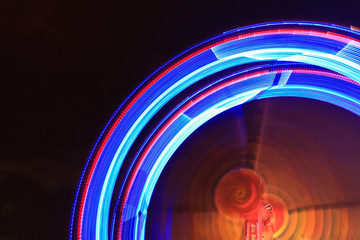 Amusement park rides by night