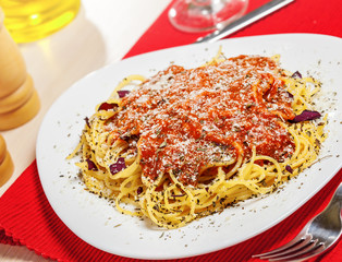 Pasta with tomato sauce and parmesan cheese