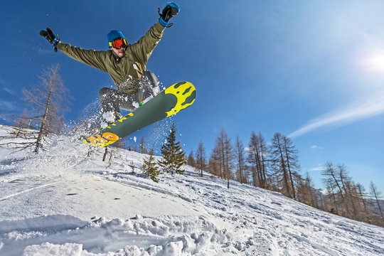 Expert snowboarder jump