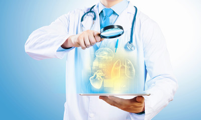 Doctor holding tablet pc