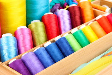 Sewing accessories in wooden box close up