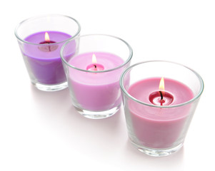 Beautiful colorful candles isolated on white