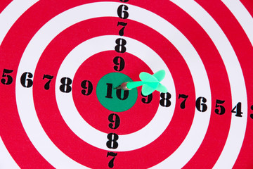 Target with dart close-up