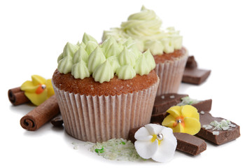 Tasty cupcakes with butter cream, isolated on white